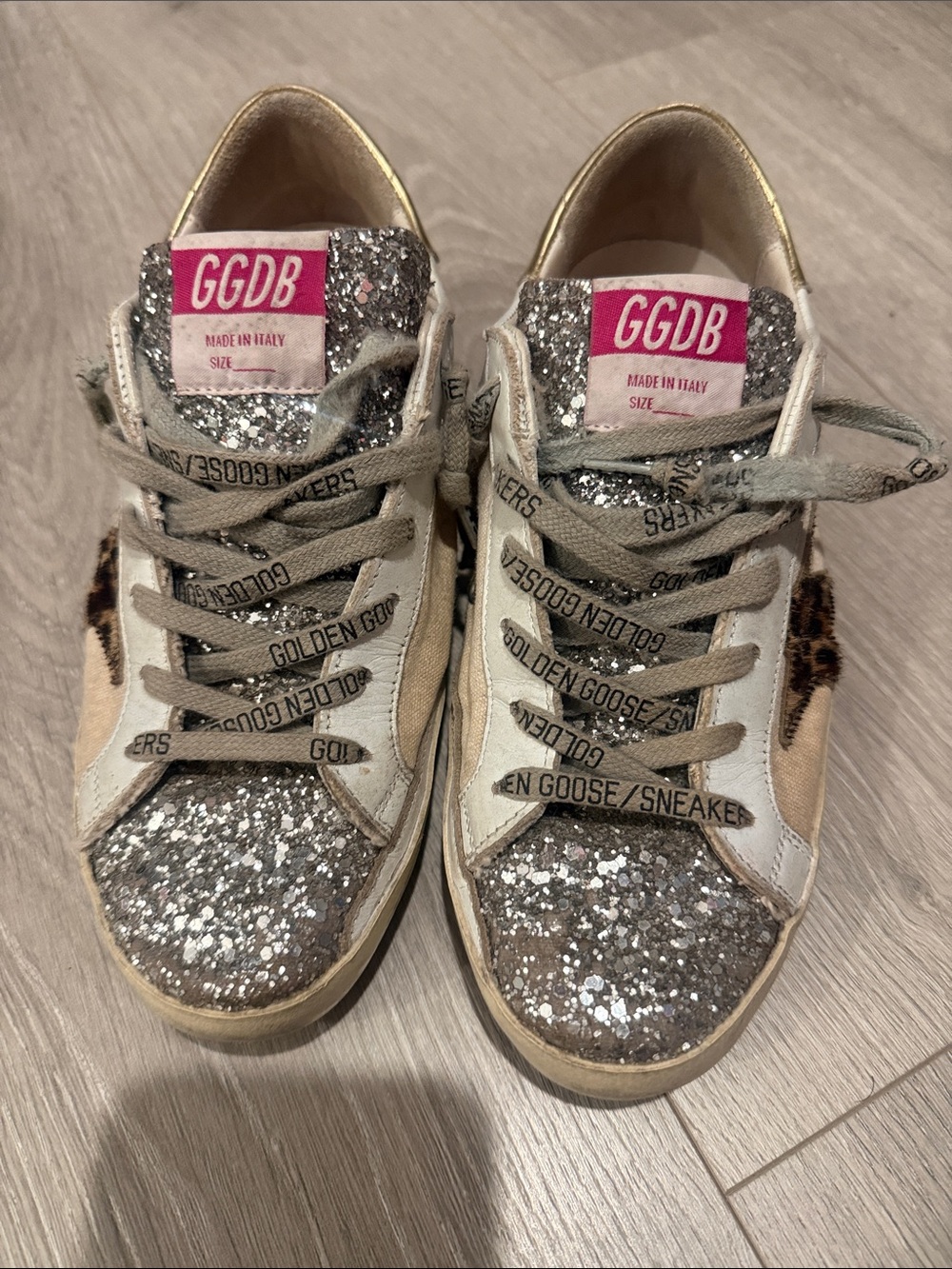 Golden Goose silver glitter low-top sneakers with leopard star